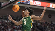March 10, 2025; Las Vegas, NV, USA; San Francisco Dons guard Tyrone Riley IV (5) dunks the basketball against the Gonzaga Bulldogs during the second half in the semifinal of the West Coast Conference tournament at Orleans Arena. Mandatory Credit: Kyle Terada-Imagn Images