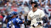 May 25, 2025; Minneapolis, Minnesota, USA; Minnesota Twins right fielder Carson McCusker (60) reacts to his strikeout against the Kansas City Royals during the second inning at Target Field.