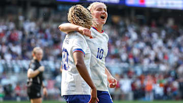 Catarina Macario and Lindsey Heaps of the USWNT