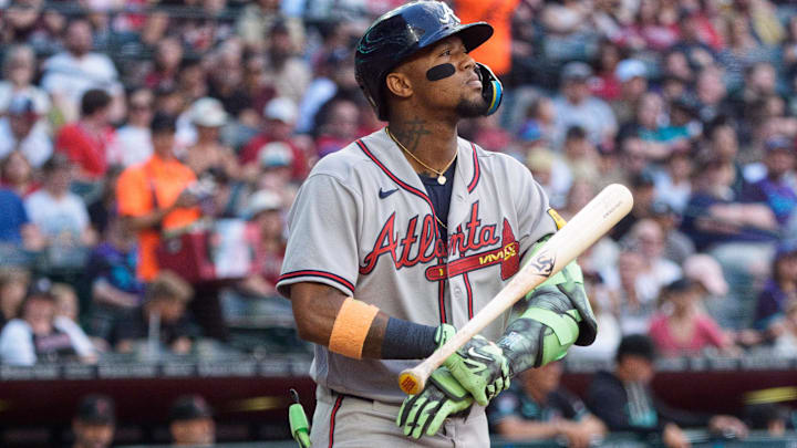Apr 4, 2026; Phoenix, Arizona, USA; Atlanta Braves outfielder Ronald Acuna Jr. (13) throws his bat after drawing a walk in the top of the third inning of a game against the Arizona Diamondbacks at Chase Field.