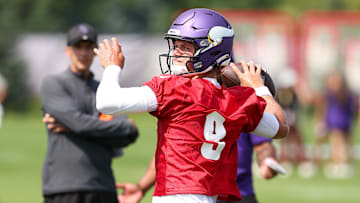 Jul 29, 2025; Eagan, MN, USA; Minnesota Vikings quarterback J.J. McCarthy (9) takes part in drills during the team's training camp at the Minnesota Vikings Training Facility.