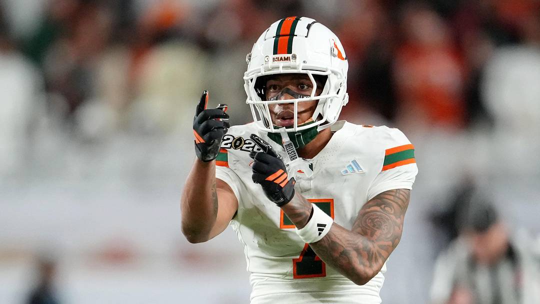 Jan 19, 2026; Miami Gardens, FL, USA; Miami Hurricanes wide receiver CJ Daniels (7) reacts after a run against the Indiana Hoosiers during the second half of the College Football Playoff National Championship game at Hard Rock Stadium. Mandatory Credit: Kirby Lee-Imagn Images