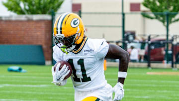 Green Bay Packers wide receiver Jayden Reed (11) runs through a drill during the second day of training camp on Thursday, July 24, 2025, at Ray Nitschke Field in Ashwaubenon, Wis.