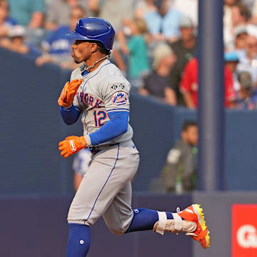 Sep 11, 2024; Toronto, Ontario, CAN; New York Mets shortstop Francisco Lindor (12) runs the bases after hitting a home run against the Toronto Blue Jays during the ninth inning at Rogers Centre. Mandatory Credit: Nick Turchiaro-Imagn Images