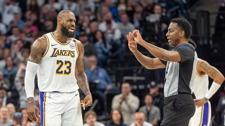 Los Angeles Lakers forward LeBron James talks with a referee against the Minnesota Timberwolves during the 2025 NBA Playoffs