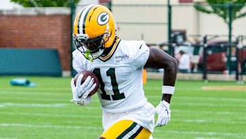 Green Bay Packers wide receiver Jayden Reed (11) runs through a drill during the second day of training camp on Thursday, July 24, 2025, at Ray Nitschke Field in Ashwaubenon, Wis.