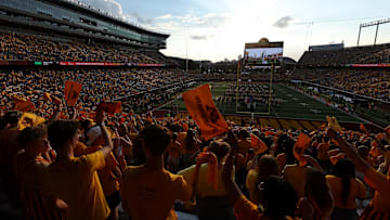 Aug 28, 2025; Minneapolis, Minnesota, USA; Minnesota Golden Gophers fans wave towels before the game against the Buffalo Bulls at Huntington Bank Stadium. Mandatory Credit: Matt Krohn-Imagn Images