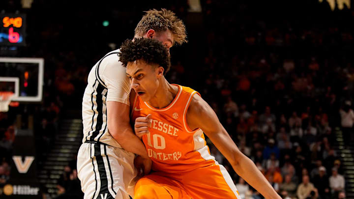 Tennessee forward Nate Ament (10) fights to get past Vanderbilt forward Tyler Nickel (5) during the first half at Memorial Gym in Nashville, Tenn., Saturday, Feb. 21, 2026.