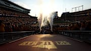 Aug 28, 2025; Minneapolis, Minnesota, USA; Minnesota Golden Gophers players take the field before the game against the Buffalo Bulls at Huntington Bank Stadium. Mandatory Credit: Matt Krohn-Imagn Images