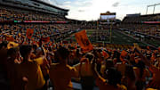 Aug 28, 2025; Minneapolis, Minnesota, USA; Minnesota Golden Gophers fans wave towels before the game against the Buffalo Bulls at Huntington Bank Stadium. Mandatory Credit: Matt Krohn-Imagn Images