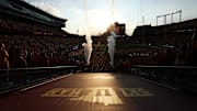 Aug 28, 2025; Minneapolis, Minnesota, USA; Minnesota Golden Gophers players take the field before the game against the Buffalo Bulls at Huntington Bank Stadium. Mandatory Credit: Matt Krohn-Imagn Images