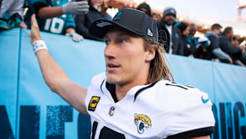 Nov 30, 2025; Nashville, Tennessee, USA;  Jacksonville Jaguars quarterback Trevor Lawrence (16) high fives the fans against the Tennessee Titans during the second half at Nissan Stadium. Mandatory Credit: Steve Roberts-Imagn Images