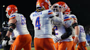 Nov 16, 2024; San Jose, California, USA; Boise State Broncos running back Ashton Jeanty (2) is congratulated by quarterback Maddux Madsen (4) after scoring a touchdown against the San Jose State Spartans in the fourth quarter at CEFCU Stadium. Mandatory Credit: Cary Edmondson-Imagn Images
