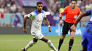 Nov 25, 2022; Al Khor, Qatar; England forward Marcus Rashford (11) dribbles the ball against the United States of America during the second half of a group stage match during the 2022 World Cup at Al Bayt Stadium. Mandatory Credit: Yukihito Taguchi-Imagn Images