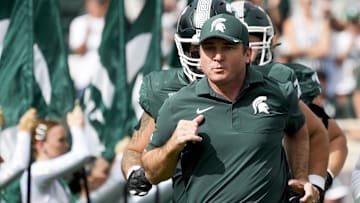 Sep 13, 2025; East Lansing, Michigan, USA; Michigan State head coach Jonathan Smith takes the field before a game against Youngstown State at Spartan Stadium. Mandatory Credit: Brendan Mullin-Imagn Images