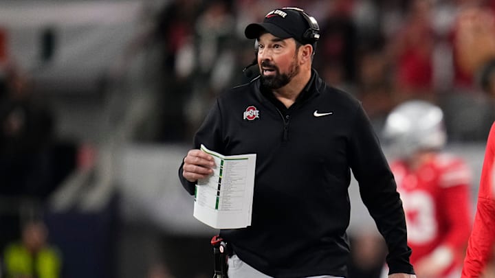 Ohio State Buckeyes head coach Ryan Day watches from the sideline during the Cotton Bowl at AT&T Stadium in Arlington, Texas for the College Football Playoff quarterfinal game against the Miami Hurricanes on Dec. 31, 2025.