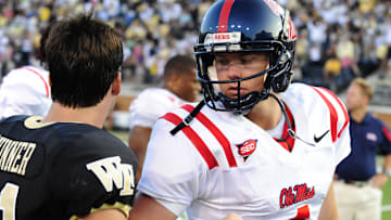 Sept. 9, 2008; Winston-Salem, NC, USA; Wake Forest Demon Deacons quarterback Riley Skinner (11) is congratulated by Ole Miss  Rebels quarterback Jevan Snead (4) after Wake Forest 30-28 victory against the Ole Miss Rebels at BB&T Field. Mandatory Credit: Bob Donnan-Imagn Images