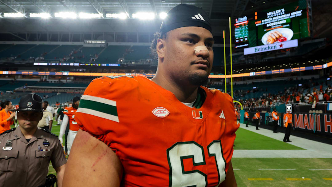 Nov 15, 2025; Miami Gardens, Florida, USA; Miami Hurricanes offensive lineman Francis Mauigoa (61) looks on after the game against NC State Wolfpack at Hard Rock Stadium. Mandatory Credit: Sam Navarro-Imagn Images