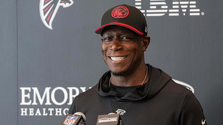 May 10, 2024; Flowery Branch, GA, USA; Atlanta Falcons head coach Raheem Morris is interviewed before the start of Rookie Minicamp at the Falcons Training Camp.   Mandatory Credit: Dale Zanine-Imagn Images