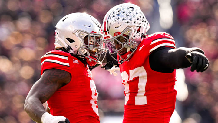 Ohio State linebacker Arvell Reese (8) and defensive end Kenyatta Jackson Jr. are two of SI's top 100 ranked prospects. Ohio State linebacker Arvell Reese (8) and defensive end Kenyatta Jackson Jr. are two of SI's top 100 ranked prospects.