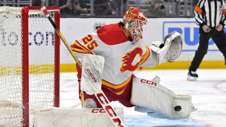 Apr 11, 2024; Los Angeles, California, USA; Calgary Flames goaltender Jacob Markstrom (25) makes a save in the second period against the Los Angeles Kings at Crypto.com Arena. Mandatory Credit: Jayne Kamin-Oncea-USA TODAY Sports