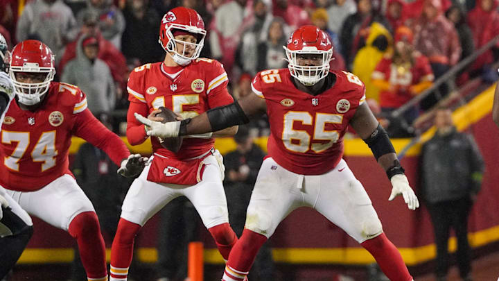 Nov 20, 2023; Kansas City, Missouri, USA; Kansas City Chiefs guard Trey Smith (65) on the line of scrimmage against the Philadelphia Eagles during the game at GEHA Field at Arrowhead Stadium. Mandatory Credit: Denny Medley-Imagn Images