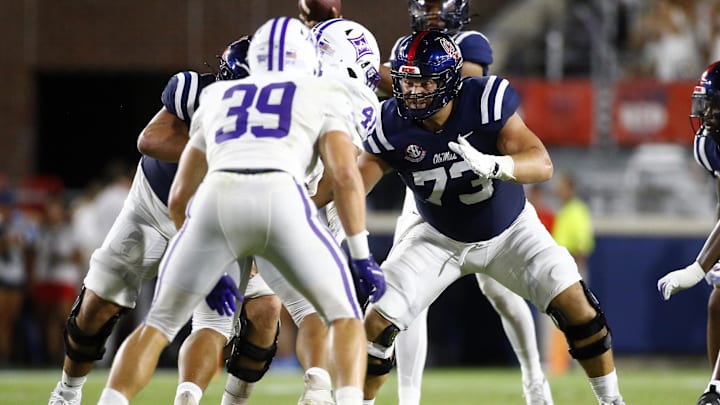 Aug 31, 2024; Oxford, Mississippi, USA; Mississippi Rebels offensive linemen Eli Acker (73) blocks during the second half  against the Furman Paladins at Vaught-Hemingway Stadium. Mandatory Credit: Petre Thomas-Imagn Images