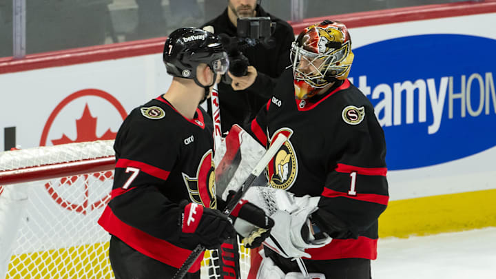 Jan 12, 2025; Ottawa, Ontario, CAN;Ottawa Senators left wing Brady Tkachuk (7) congratulates goalie Leevi Merilainen (1) following their win against the Dallas Stars  at the Canadian Tire Centre. Mandatory Credit: Marc DesRosiers-Imagn Images