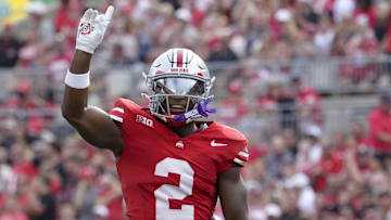 August 31, 2024; Columbus, Ohio, USA;
Ohio State Buckeyes safety Caleb Downs (2) celebrates after sacking Akron Zips quarterback Ben Finley (10) during the first half of Saturday’s NCAA Division I football game at Ohio Stadium.