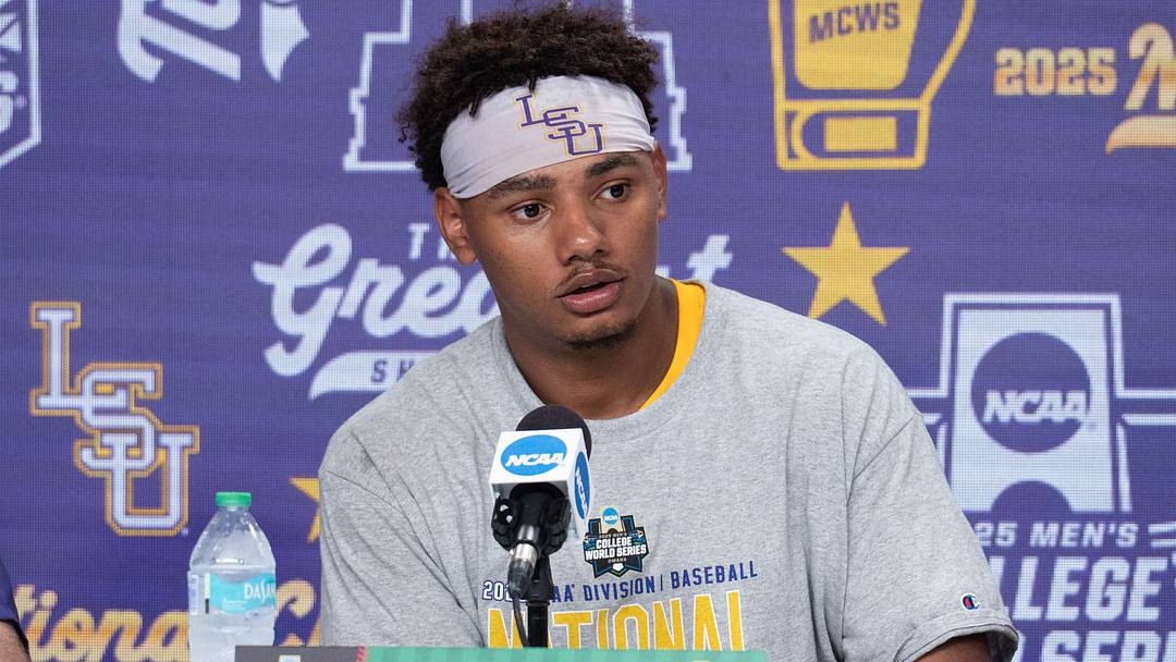 Jun 22, 2025; Omaha, Neb, USA; LSU Tigers starting pitcher Anthony Eyanson (24) meets with the press after the game against the Coastal Carolina Chanticleers at Charles Schwab Field. Mandatory Credit: Steven Branscombe-Imagn Images Jun 22, 2025; Omaha, Neb, USA; LSU Tigers starting pitcher Anthony Eyanson (24) meets with the press after the game against the Coastal Carolina Chanticleers at Charles Schwab Field. Mandatory Credit: Steven Branscombe-Imagn Images