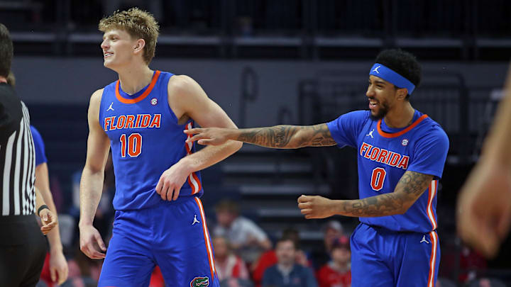 Feb 21, 2026; Oxford, Mississippi, USA; Florida Gators forward Thomas Haugh (10) and guard Boogie Fland (0) react during the second half against the Mississippi Rebels at The Sandy and John Black Pavilion at Ole Miss. Mandatory Credit: Petre Thomas-Imagn Images