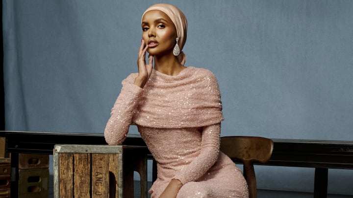 Halima Aden was photographed by Yu Tsai in Hollywood, Fla. Dress by Reem Acra. Jewelry by Charlie Lapson.