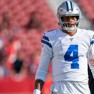 Dallas Cowboys quarterback Dak Prescott (4) and owner Jerry Jones