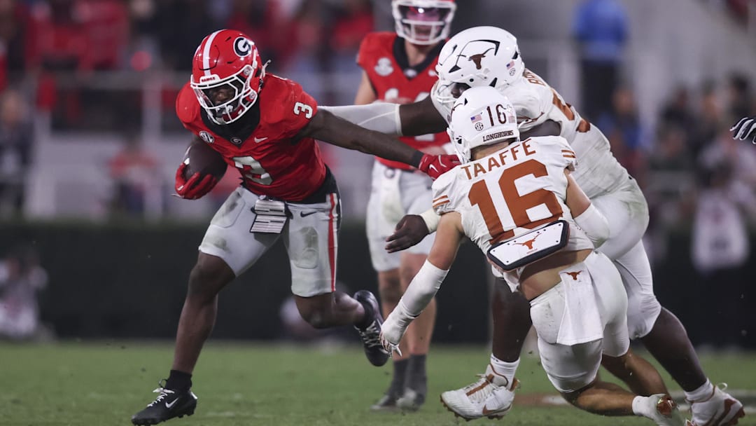 Nov 15, 2025; Athens, Georgia, USA; Georgia Bulldogs running back Nate Frazier (3) attempts to elude a tackle in the second half against the Texas Longhorns at Sanford Stadium. Mandatory Credit: Brett Davis-Imagn Images