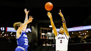 Missouri State sophomore Dez White shoots a three-point field goal attempt as the Bears took on the UT Arlington Mavericks at Great Southern Bank Arena on Tuesday, Nov. 19, 2024.