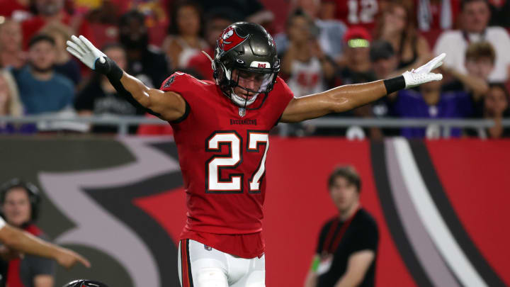 Aug 26, 2023; Tampa, Florida, USA; Tampa Bay Buccaneers safety Kaevon Merriweather (26) break up Baltimore Ravens tight end Charlie Kolar (88) catch as Tampa Bay Buccaneers cornerback Zyon McCollum (27) reacts during the second quarter at Raymond James Stadium. Mandatory Credit: Kim Klement Neitzel-USA TODAY Sports