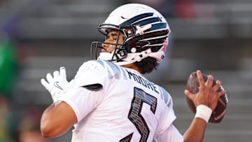 Oct 18, 2025; Piscataway, New Jersey, USA; Oregon Ducks quarterback Dante Moore (5) warms up before the game against the Rutgers Scarlet Knights at SHI Stadium. 