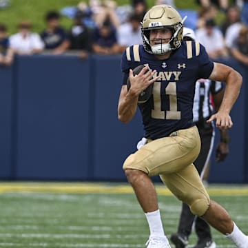 Aug 31, 2024; Annapolis, Maryland, USA;  Navy Midshipmen quarterback Blake Horvath (11) rushes during the first half against the Bucknell Bison at Navy-Marine Corps Memorial Stadium. Mandatory Credit: Tommy Gilligan-Imagn Images