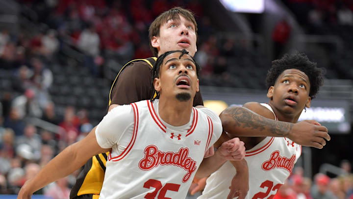 Mar 8, 2025; St. Louis, MO, Bradley Braves forward Darius Hannah (35) and teammate Bradley Braves guard Gus Rugaard (23) block out Valparaiso Beacons forward Cooper Schwieger (13) during the second half at Enterprise Center. Mandatory Credit: Ron Johnson-Imagn Images