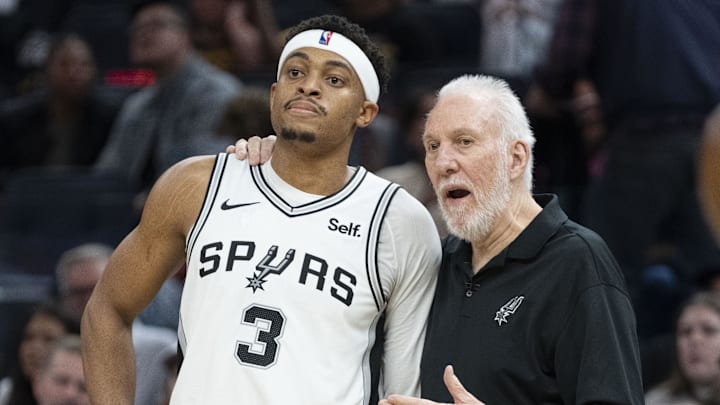 November 24, 2023; San Francisco, California, USA; San Antonio Spurs head coach Gregg Popovich (Right) talks to forward Keldon Johnson (3) during the third quarter against the Golden State Warriors at Chase Center. Mandatory Credit: Kyle Terada-Imagn Images