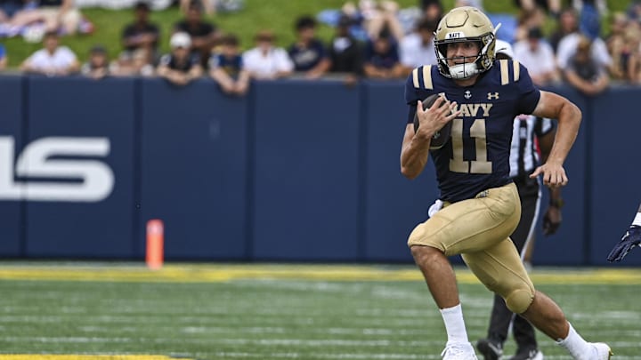 Aug 31, 2024; Annapolis, Maryland, USA;  Navy Midshipmen quarterback Blake Horvath (11) rushes during the first half against the Bucknell Bison at Navy-Marine Corps Memorial Stadium. Mandatory Credit: Tommy Gilligan-Imagn Images