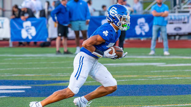 Detroit Catholic Central's Samson Gash returns a punt during a football game on Friday, Aug. 29, 2025.