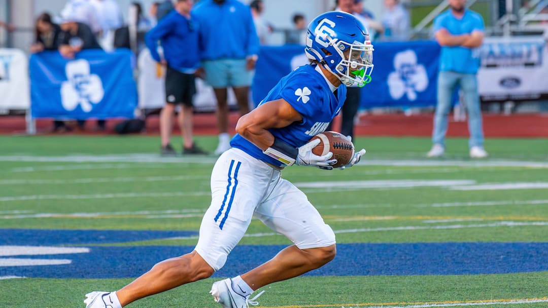 Detroit Catholic Central's Samson Gash returns a punt during a football game on Friday, Aug. 29, 2025.