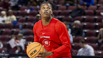 Mar 19, 2025; Wichita, KS, USA;  Georgia Bulldogs forward RJ Godfrey (10) prepares to shoo the ball during a practice session at Intrust Bank Arena. Mandatory Credit: Nick Tre. Smith-Imagn Images