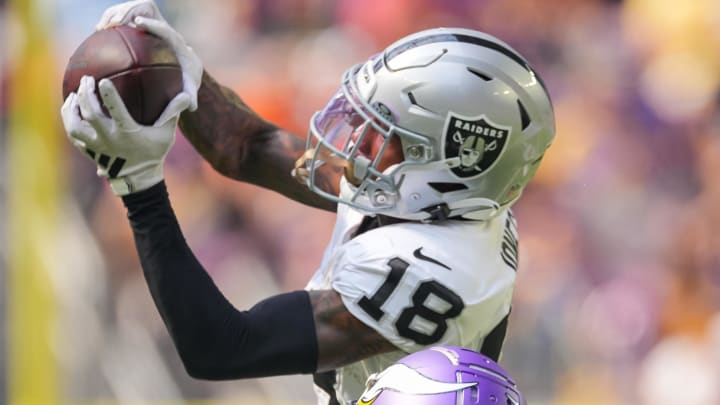 Aug 10, 2024; Minneapolis, Minnesota, USA; Las Vegas Raiders cornerback Jack Jones (18) interecpts a pass from Minnesota Vikings quarterback J.J. McCarthy (9) in the second quarter at U.S. Bank Stadium. Mandatory Credit: Brad Rempel-USA TODAY Sports