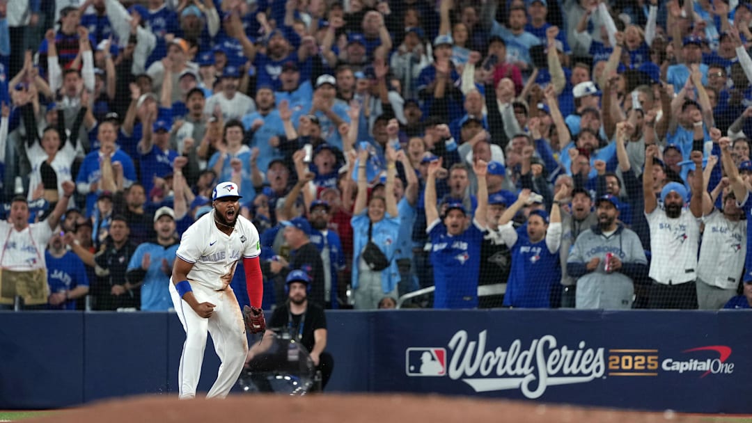 Nov 1, 2025; Toronto, Ontario, CAN; Toronto Blue Jays first baseman Vladimir Guerrero Jr. (27) reacts after a play against the Los Angeles Dodgers in the fourth inning for game seven of the 2025 MLB World Series at Rogers Centre. Mandatory Credit: Nick Turchiaro-Imagn Images