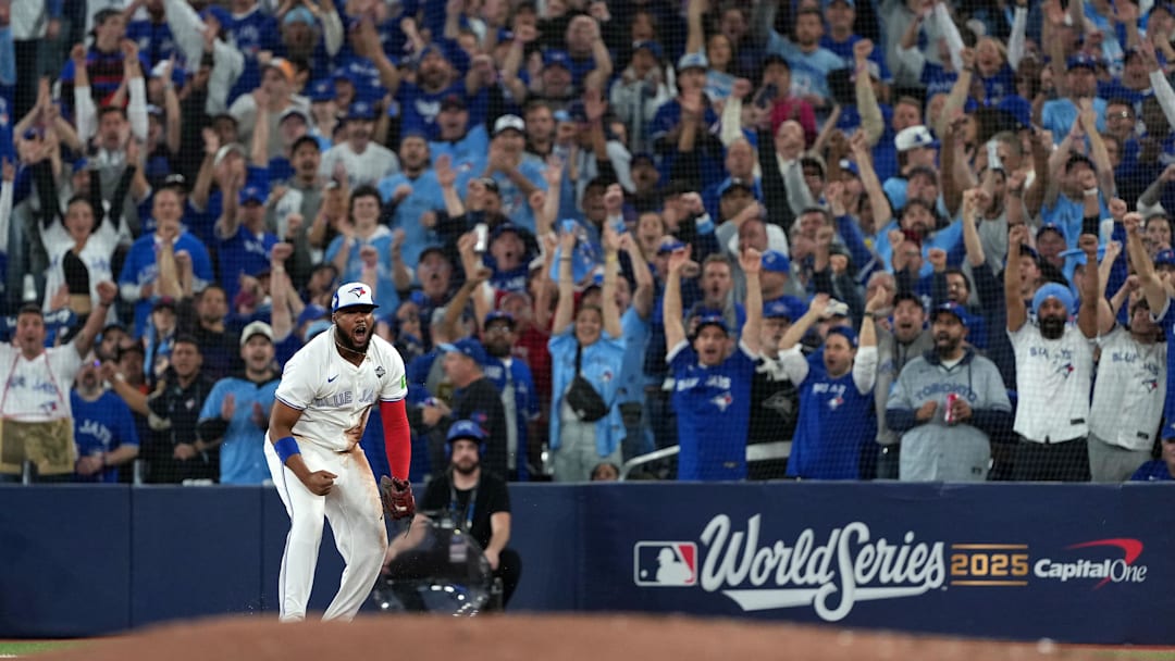 Nov 1, 2025; Toronto, Ontario, CAN; Toronto Blue Jays first baseman Vladimir Guerrero Jr. (27) reacts after a play against the Los Angeles Dodgers in the fourth inning for game seven of the 2025 MLB World Series at Rogers Centre. Mandatory Credit: Nick Turchiaro-Imagn Images