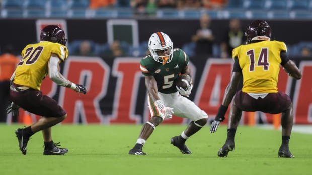 Miami Hurricanes wide receiver Ray Ray Joseph (5) runs with the football against the Bethune Cookman Wildcats during the four