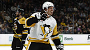 Nov 29, 2024; Boston, Massachusetts, USA; Pittsburgh Penguins right wing Rickard Rakell (67) celebrates his goal as Boston Bruins center Pavel Zacha (18) skates away during the second period at TD Garden. Mandatory Credit: Winslow Townson-Imagn Images