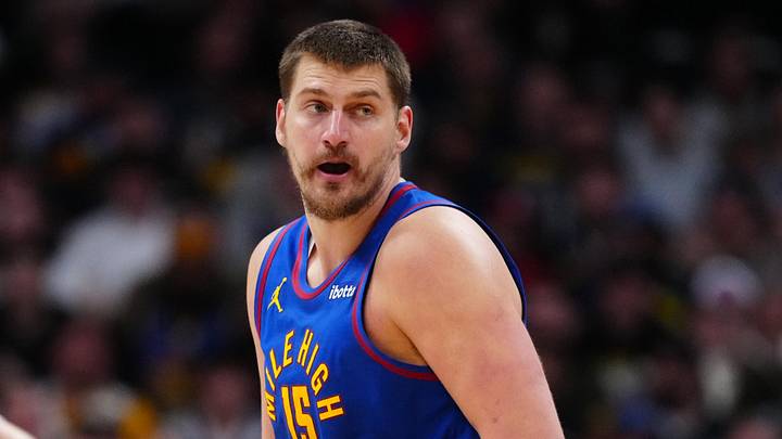 Mar 11, 2026; Denver, Colorado, USA; Denver Nuggets center Nikola Jokic (15)  controls the ball in the second quarter against the Houston Rockets at Ball Arena. Mandatory Credit: Ron Chenoy-Imagn Images